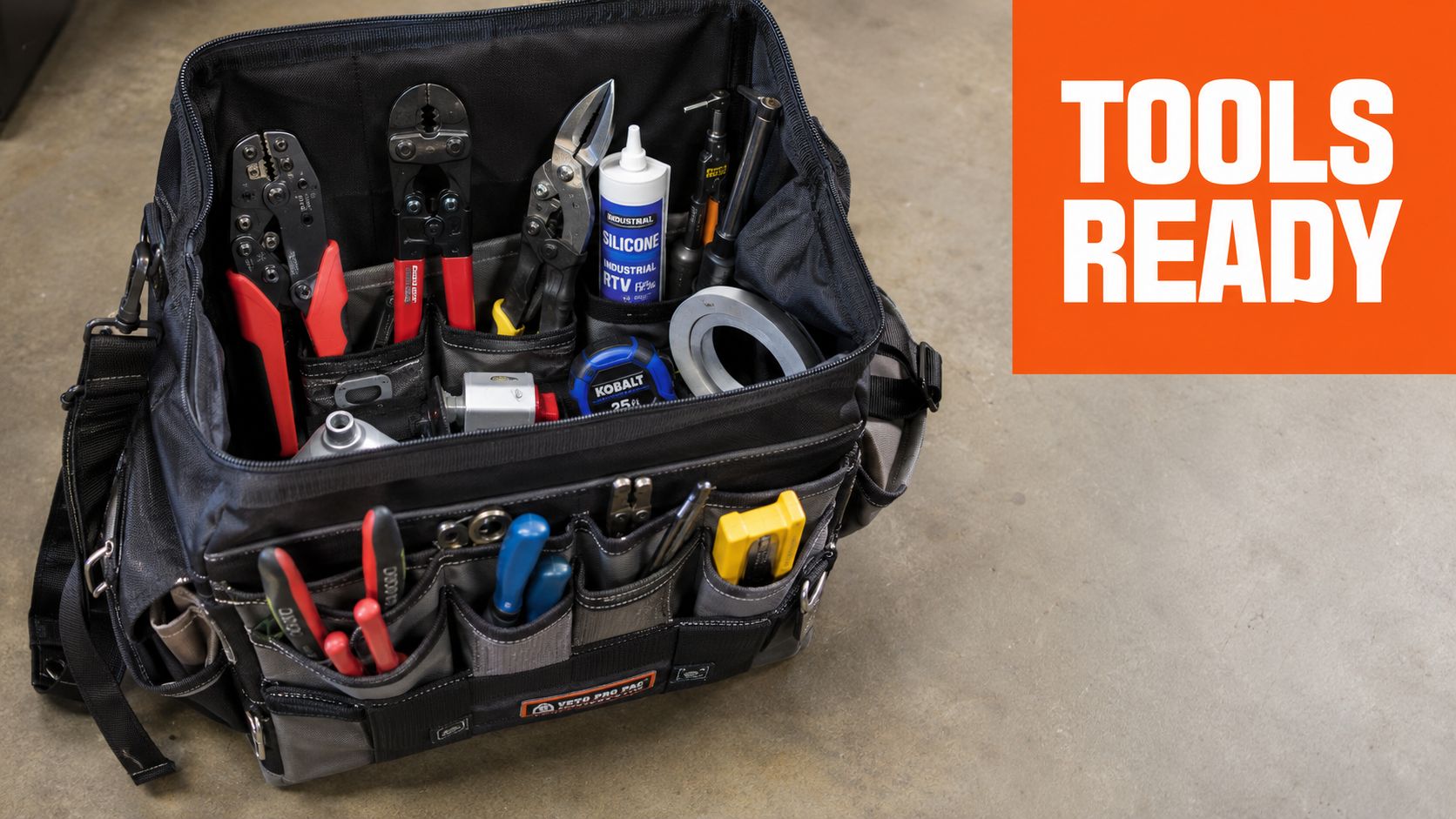 A Veto Pro Pac tool bag filled with professional electrician tools including pliers, tape, and sealant.